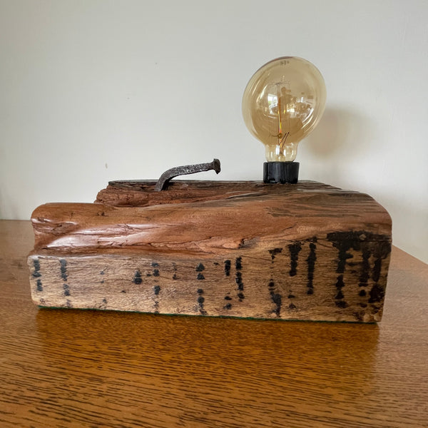 Original wharf timber table lamp handcrafted by shades at grays with edison bulb, unlit, front view.