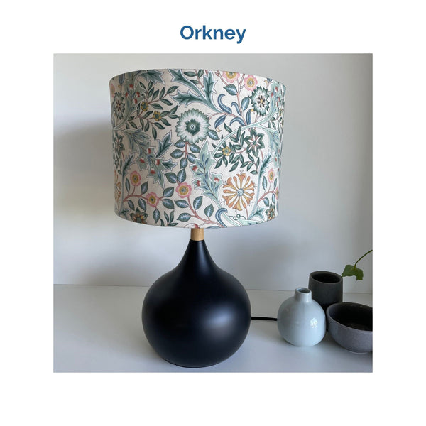 Orkney fabric on medium drum lampshade and black touch base, unlit, crafted by shades at grays