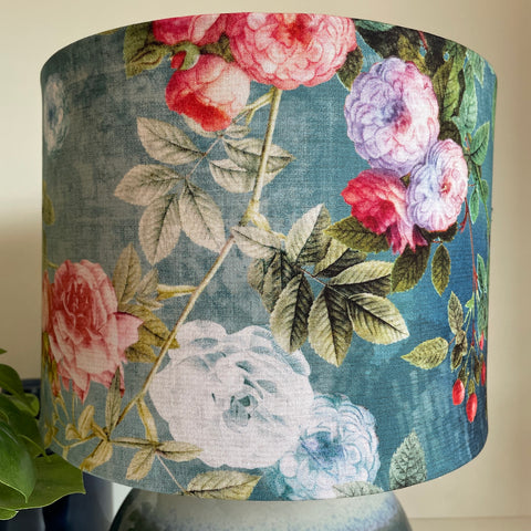 Hips and flowers on ocean blue background, handcrafted fabric medium drum lamps shade, made by Shades at Grays, unlit.