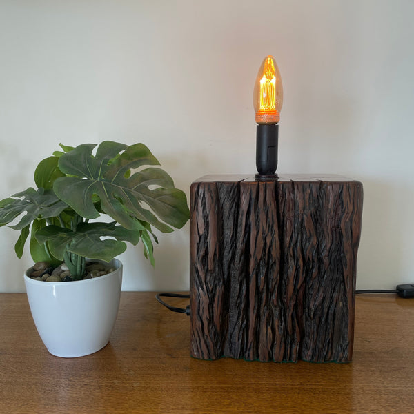Reclaimed jarrah wharf timber wood table lamp, by shades at grays, front view.