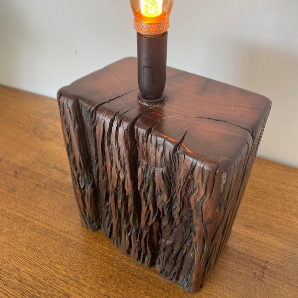 Reclaimed jarrah wharf timber wood table lamp, by shades at grays, top and front view.
