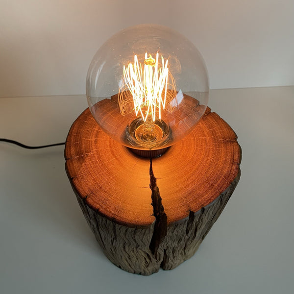 Round wooden table lamp crafted from rustic telegraph post with edison bulb, natural scar and polished top, crafted by shades at grays