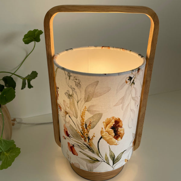 Scandi style table lamp with floral print on white background, crafted by shades at grays, nz, unlit.