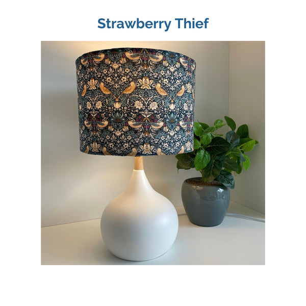 Strawberry Thief fabric on white touch lamp, lit, crafted by shades at grays.