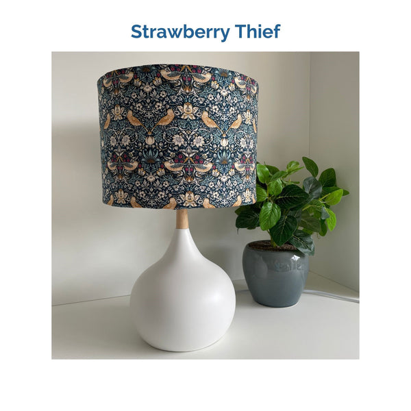 Strawberry Thief fabric on white touch lamp, unlit, crafted by shades at grays.