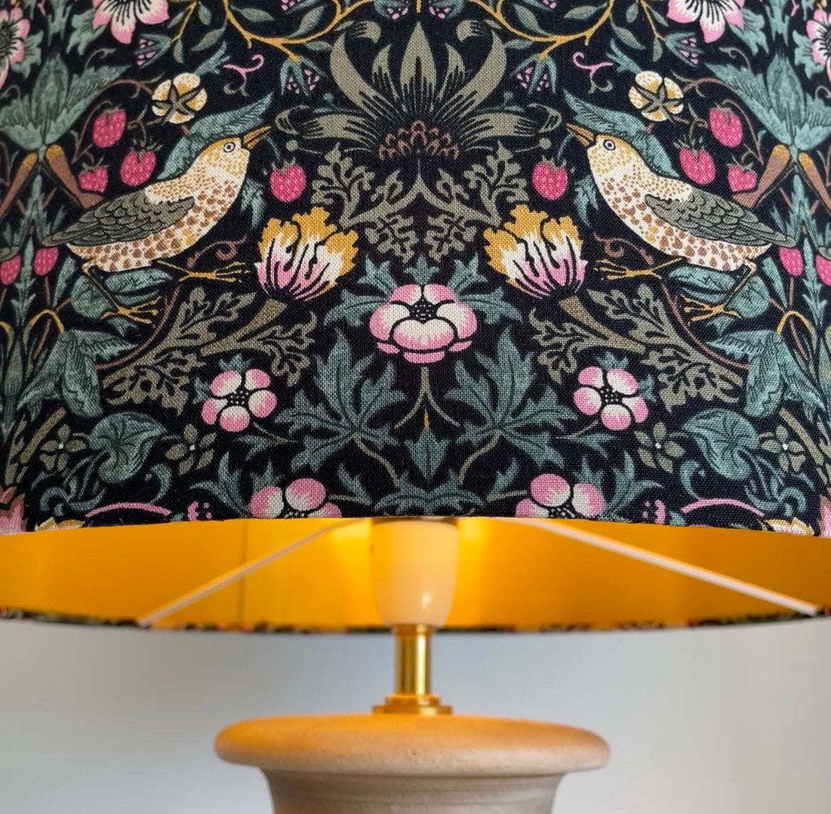 Strawberry thief black, william morris fabric handcrafted lampshade with gold inner by shades at grays.
