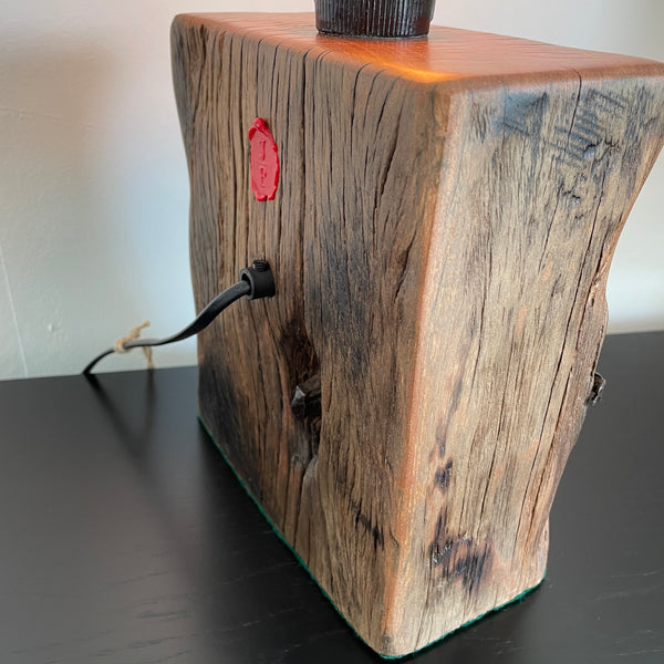 Table lamp crafted from original wharf timber by shades at grays nz, close up of wood grain on side and back.