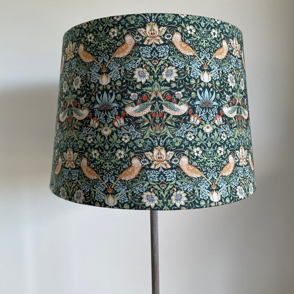 Tapered 24 lampshade with strawberry thief mini marine fabric, unlit, crafted by shades at grays.