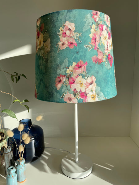 Tapered 23 fabric light shade on white stand, hand crafted by Shades at Grays