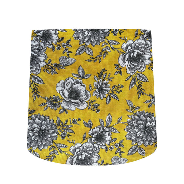 Tapered lampshade handcrafted by shades at grays with floral glow fabric.