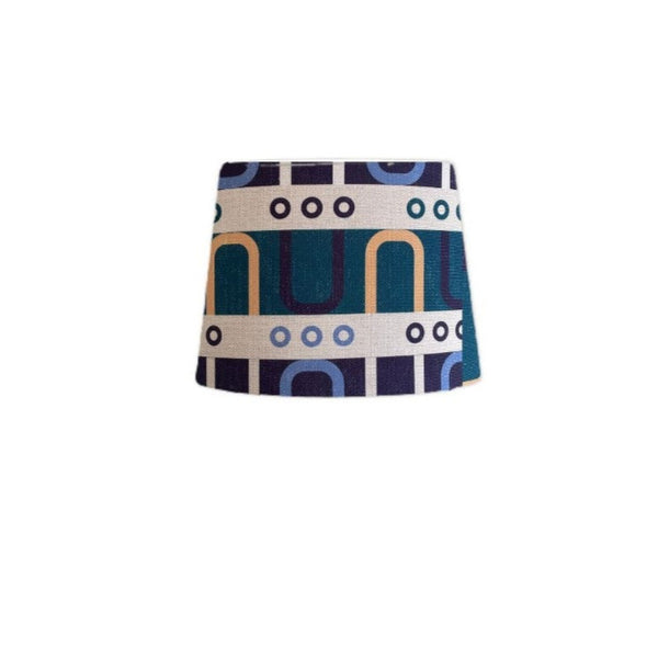 Tapered style lampshade with geometric harmony blue fabric.