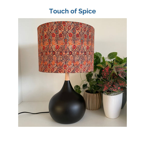 Touch of Spice fabric on medium drum lampshade and black touch base, unlit, crafted by shades at grays