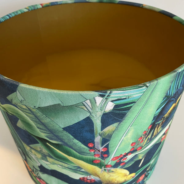 Tropical leaf patterned lampshade with a gold interior