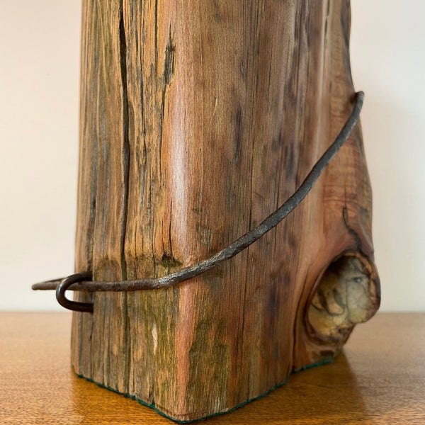 Close up of authentic wire and original wood knot on upcycled wood table lamp, handcrafted by shades at grays.