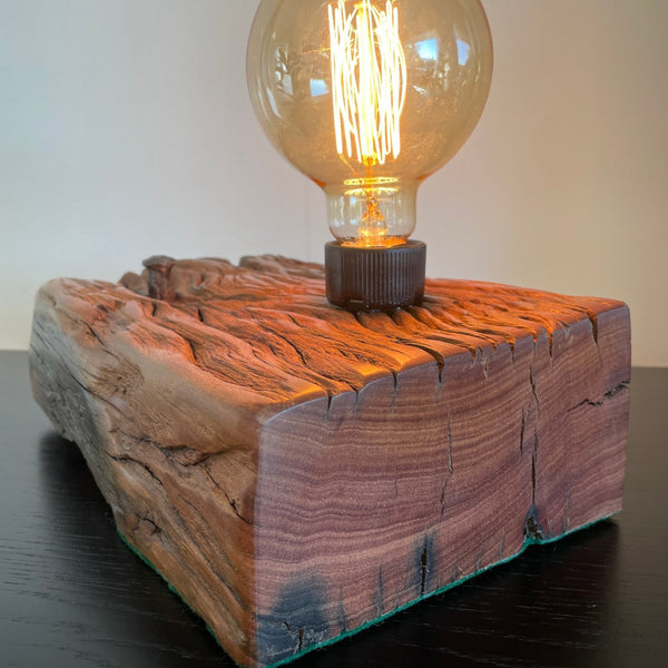 Upcycled wharf timber table lamp, handcrafted by shades at grays, side view of smooth end grain, polished with natural bees wax.