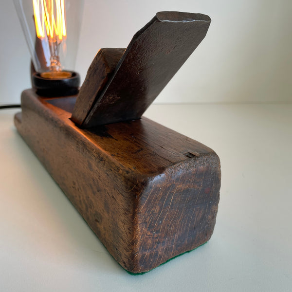 Vintage table lamp, handcrafted from carpenters wood plane, polished toe.