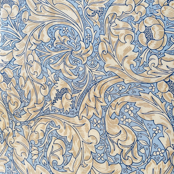 Fabric sample of William Morris Bachelors Button blue fabrci | Floral pattern with beige leaves and blue background