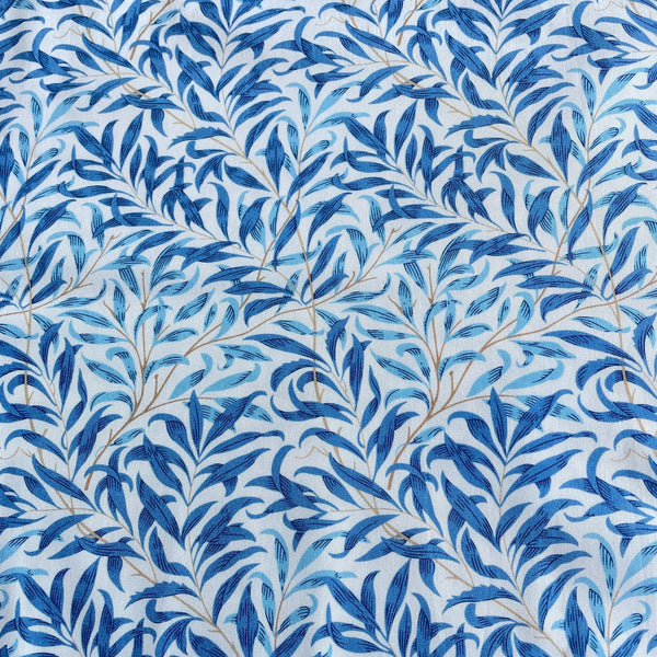 William Morris willow boughs blue - blue leaf pattern on a white background, sample.