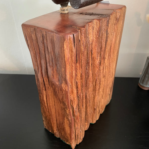 Wood door stop crafted from wharf timber with authentic railway pandrol clip, front and left side view, close up of polished top and retained erosion grooves, by shades at grays.