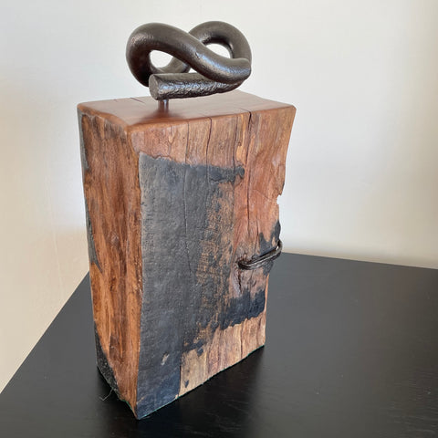 Wood door stop from reclaimed wharf timber and original railway iron by shades at grays, front and side view with original tar stains.