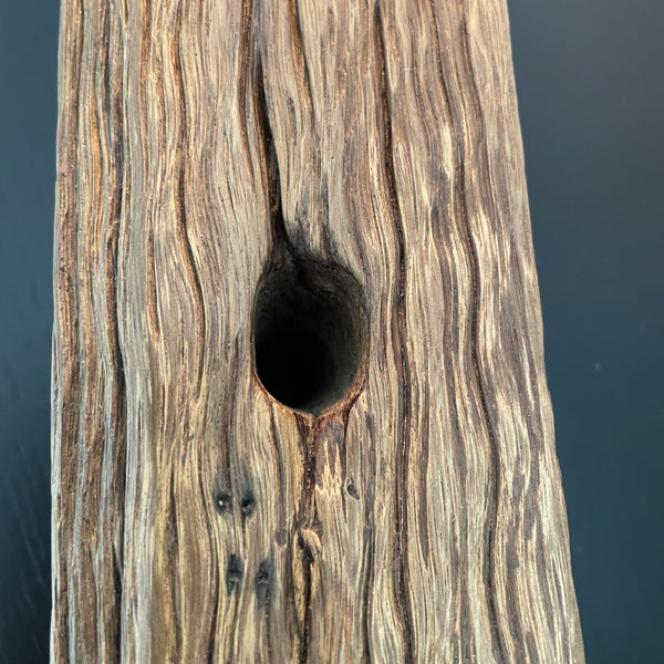 Wooden table lamp upcycled from old telegraph pole with edison bulb, close up of original bolt hole, by shades at grays.