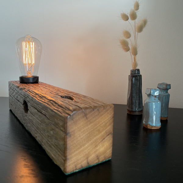 Wooden table lamp upcycled from old telegraph pole with edison bulb, smooth end grain, by shades at grays.