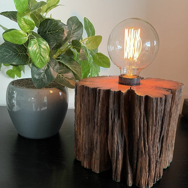 Wooden table lamp crafted from old wharf timber with edison bulb made by shades at grays. Front view.