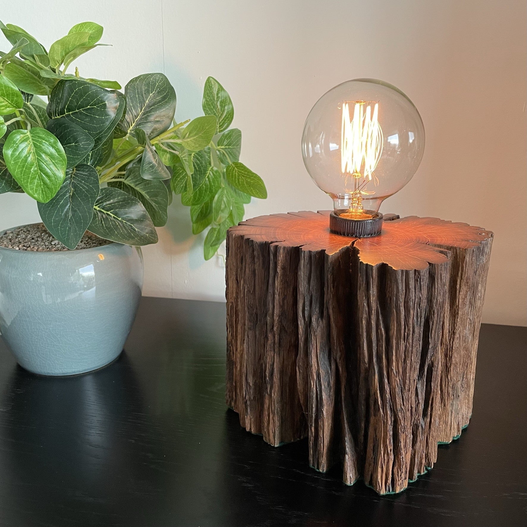 Wooden table lamp crafted from old wharf timber with edison bulb, made by shades at grays new zealand.