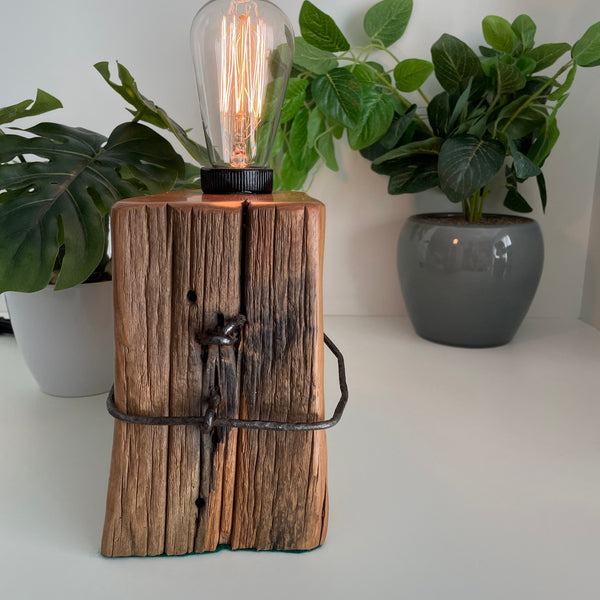 Wooden table lamp handcrafted from vintage totara post handcrafted by shades at grays in wellington, nz.