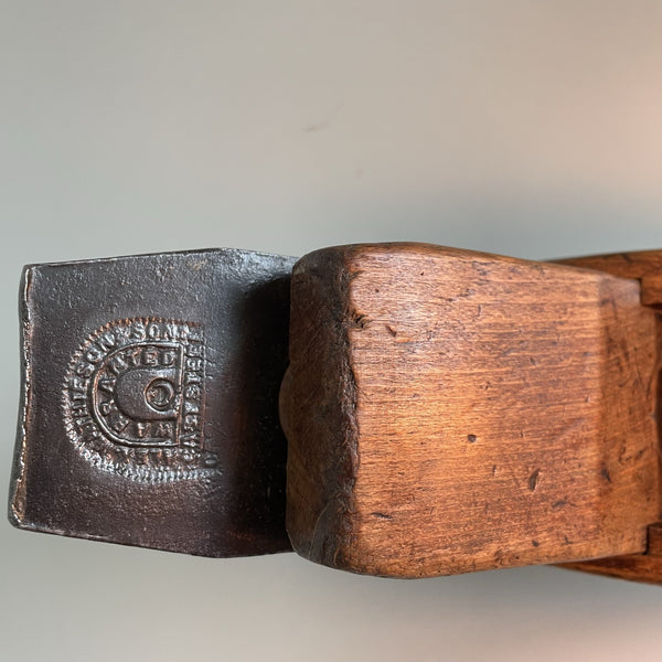 Beech wood table lamp made from vintage carpenters plane. Close up of blade detail.