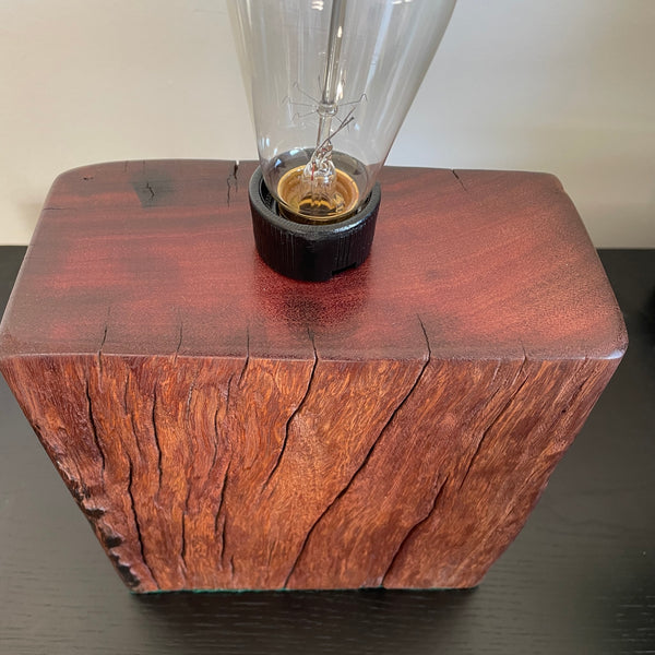 Hand crafted wood lamp created from reclaimed wharf timber, unllit, top and front view.