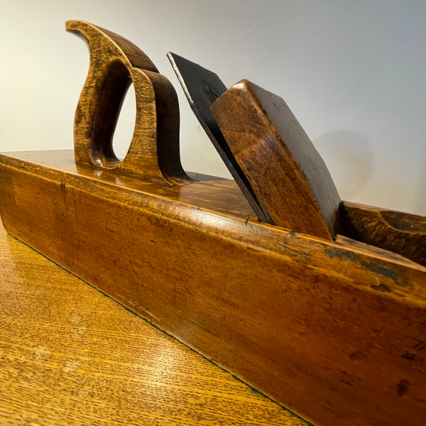 Wood table lamp upcycled from large carpenter's plane with original cutting steel and full tote handle, polished with natural beeswax crafted by shades at grays.