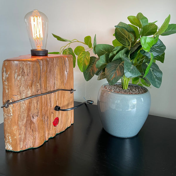 Wooden table lamp upcycled from old totara post by shades at grays with original wire, back view.