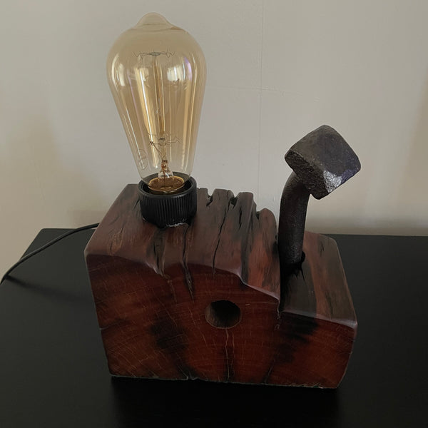 Wood table lamp upcycled from wharf timber with large vintage bolt and replica edison bulb, unlit, front view, handcrafted by shades at grays.