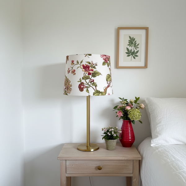 Floral Beauty lampshade on brass bedside base in garden-inspired bedroom