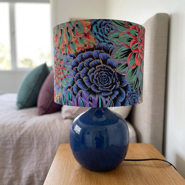 House Leeks Dark bedside lamp in a restful bedroom