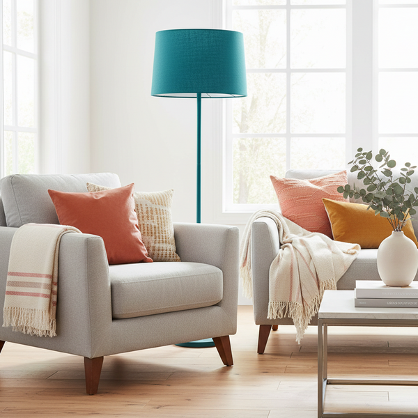 Teal linen floor lamp in modern living room with complementary cushions and homeware
