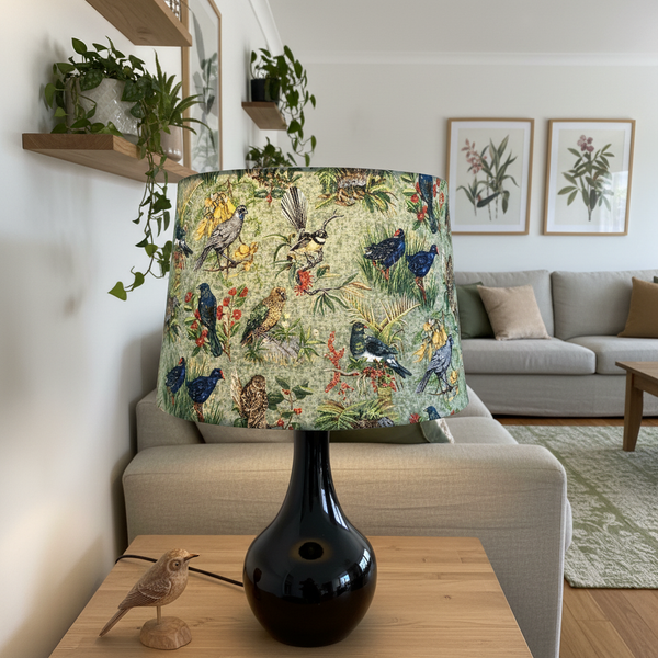 Kiwiana Birds lampshade on wood base in nature-lover's living room