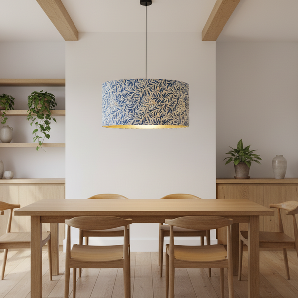Dining room with wooden table and chairs, hanging light fixture with Morris willow boughs blue handcrafted shade by shades at grays.