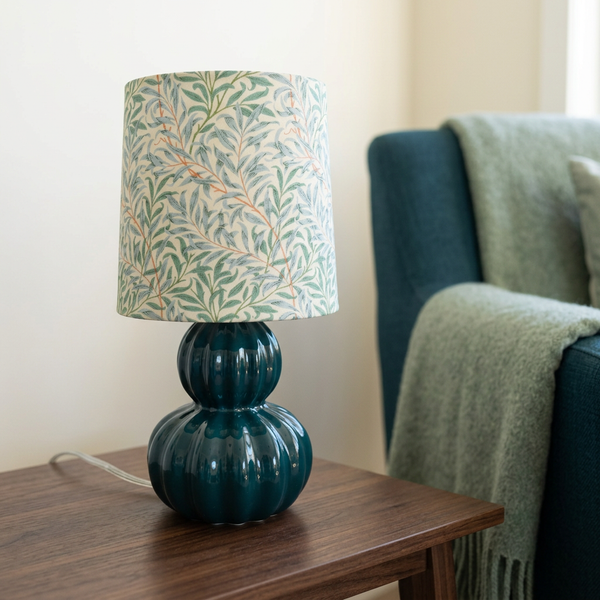 Willow Boughs teal table lamp in a coordinated reading corner