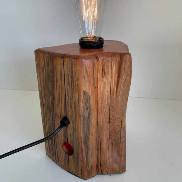 Back and side view of wooden table lamp handcrafted from old totara post. Made in New Zealand.