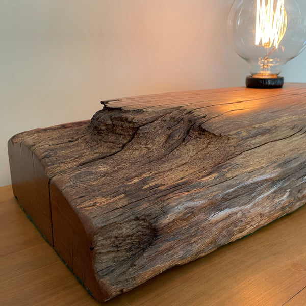 Beeswax polished grain from old wharf timber, handcrafted in Wellington NZ in to a unique wood table lamp
