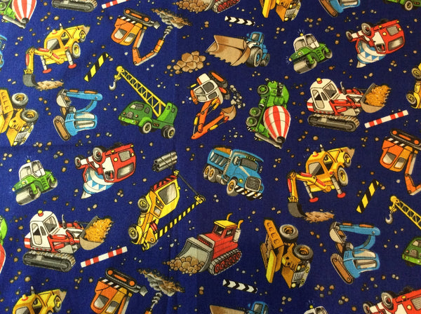 Fabric sample of construction trucks for bespoke childrens light shade, Shades at Grays.