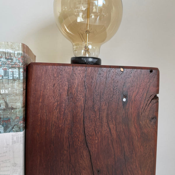 One of two handcrafted table lamp bookends, handcrafted from old square telegraph post, with additional edison light bulb,