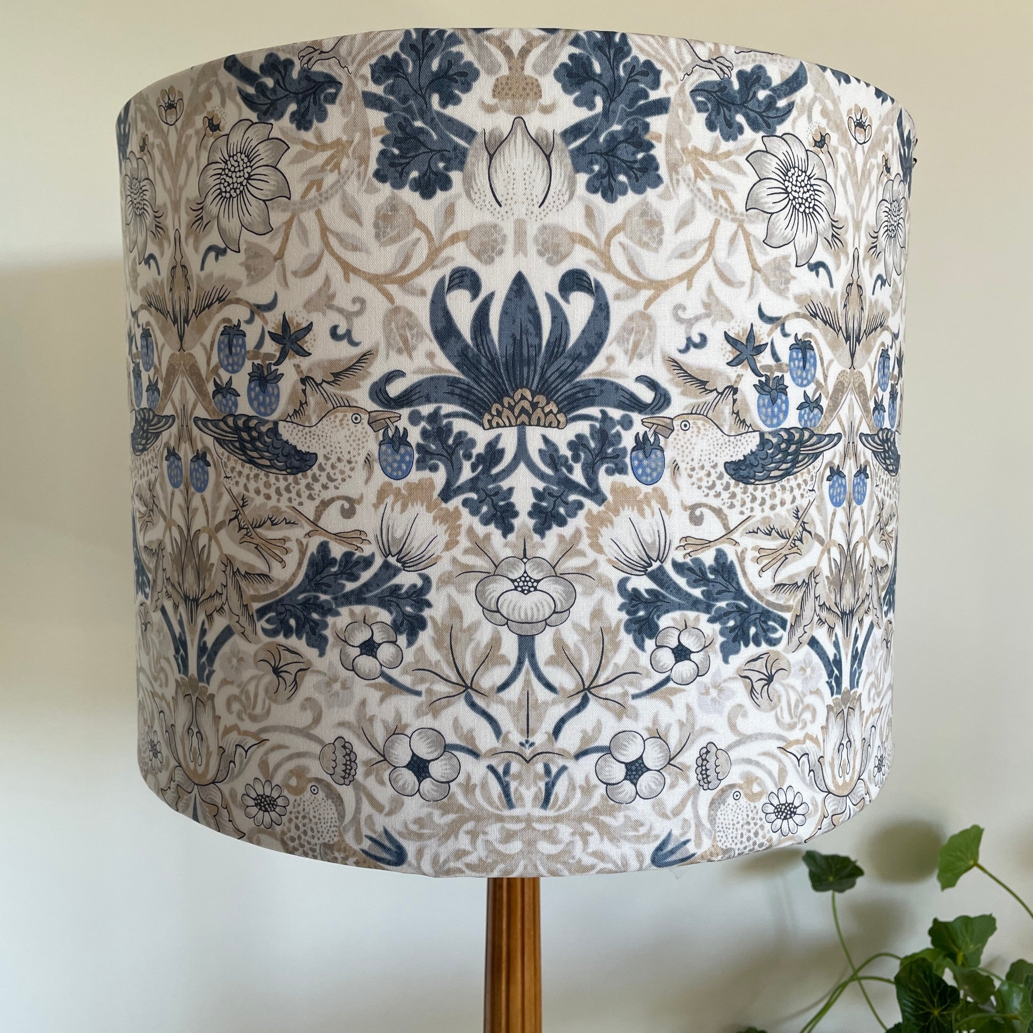 Large drum handcrafted lamp shade with William Morris fabric, unlit.