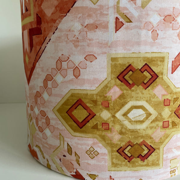 Rust orange, pinks and golds on large hand crafted lamp shade, made by Shades at Grays in New Zealand.