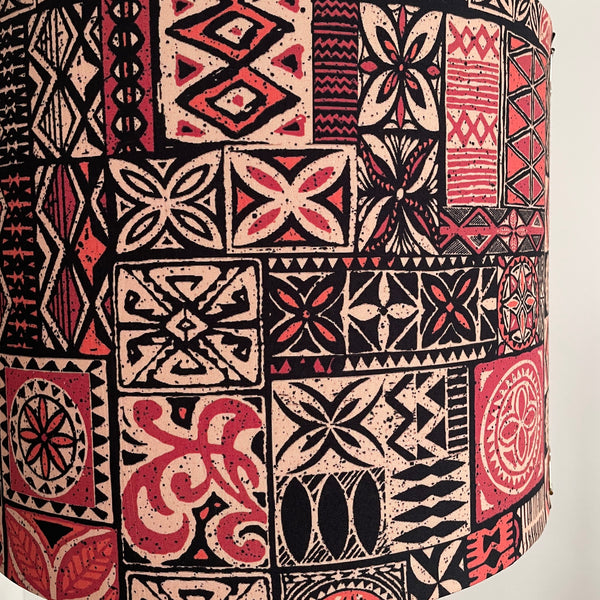 Large drum fabric lamp shade with Pacific style tapa design fabric. Unlit.