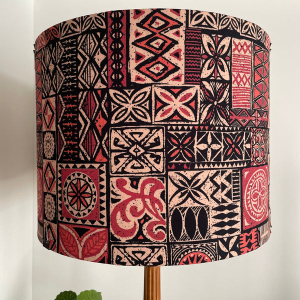 Large drum fabric lamp shade with Pacific style tapa design fabric. Unlit.