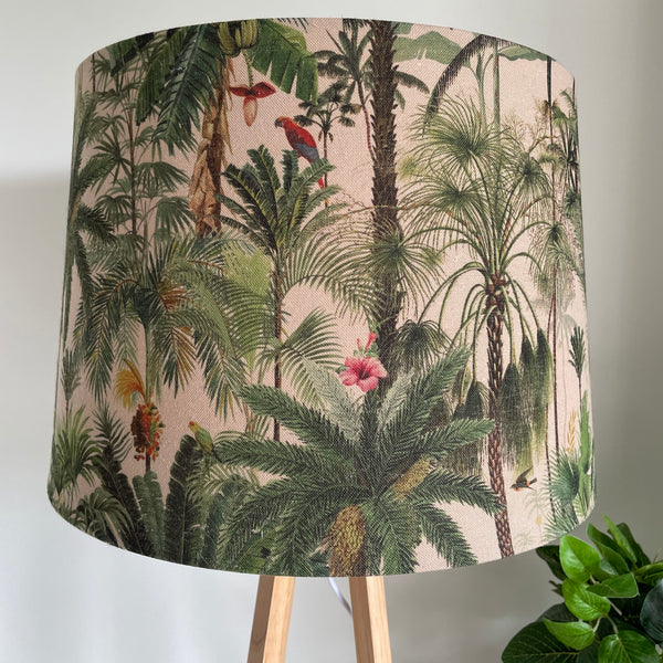 Close up of handcrafted jungle palm fabric on modern wood table lamp base, unlit