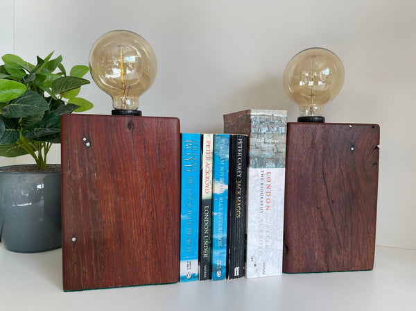 Oair of wooden table lamps, for book ends or bedside table lamps, handcrafted from chocolate coloured telegraph post.